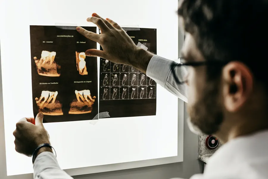 Endodontist reviewing dental X-rays